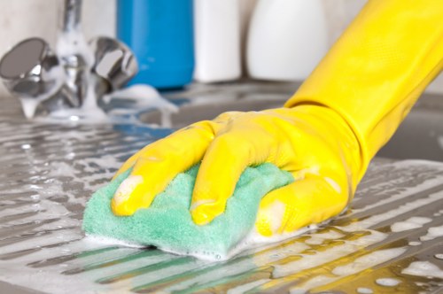 Local technician cleaning a sectional sofa in Bayswater