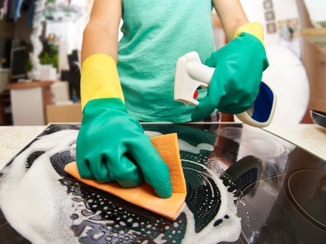Cleaner maintaining reception and shared office areas in Bayswater